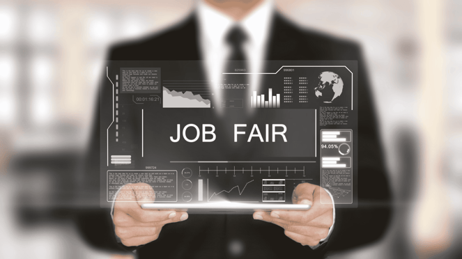 A person holds a tablet that says Job Fair